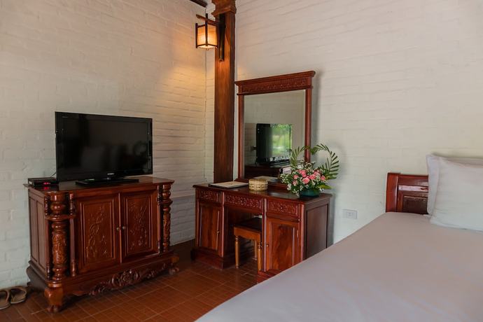 Imagen de la habitación del Hotel Mua Caves Ecolodge. Foto 7