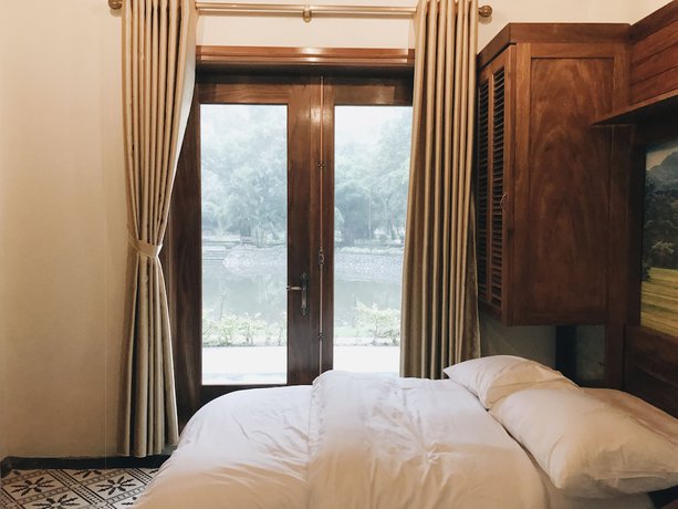 Imagen de la habitación del Hotel Mua Caves Ecolodge. Foto 9