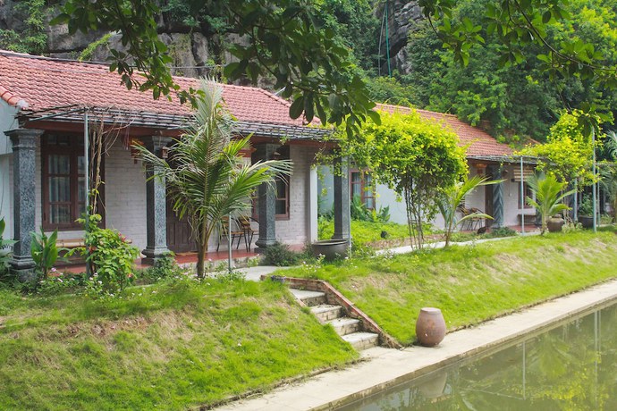 Imagen de la habitación del Hotel Mua Caves Ecolodge. Foto 16