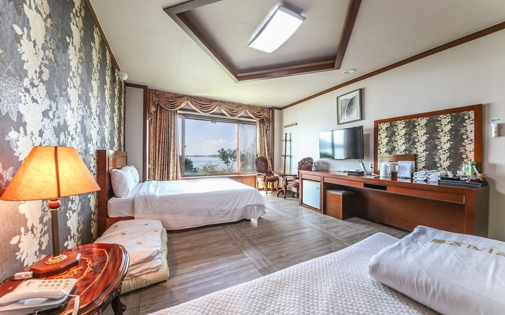 Imagen de la habitación del Hotel Muan Beach. Foto 11
