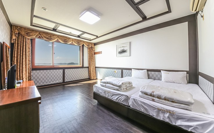 Imagen de la habitación del Hotel Muan Beach. Foto 13