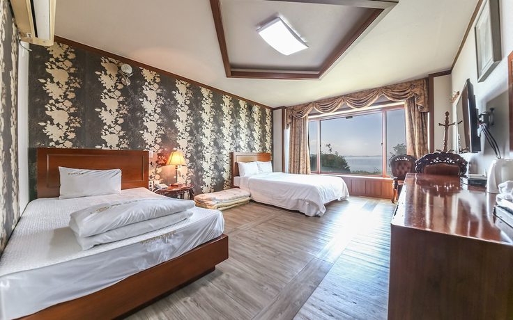 Imagen de la habitación del Hotel Muan Beach. Foto 19