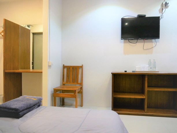 Imagen de la habitación del Hotel MuangInn. Foto 7