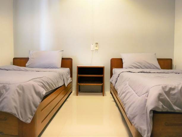 Imagen de la habitación del Hotel MuangInn. Foto 8