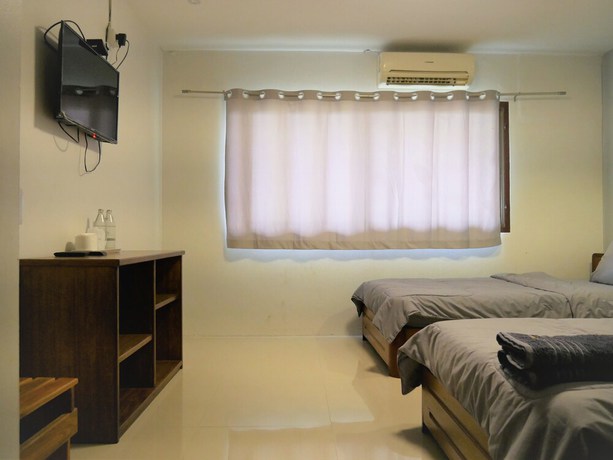 Imagen de la habitación del Hotel MuangInn. Foto 10