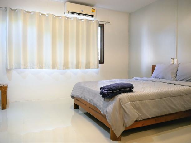 Imagen de la habitación del Hotel MuangInn. Foto 11