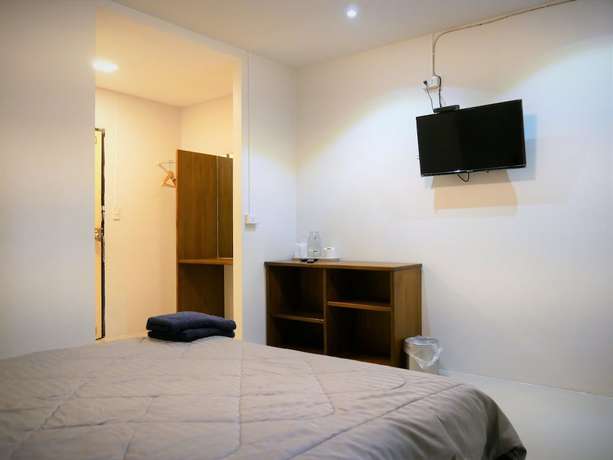 Imagen de la habitación del Hotel MuangInn. Foto 14