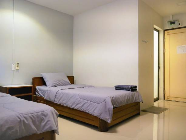 Imagen de la habitación del Hotel MuangInn. Foto 15