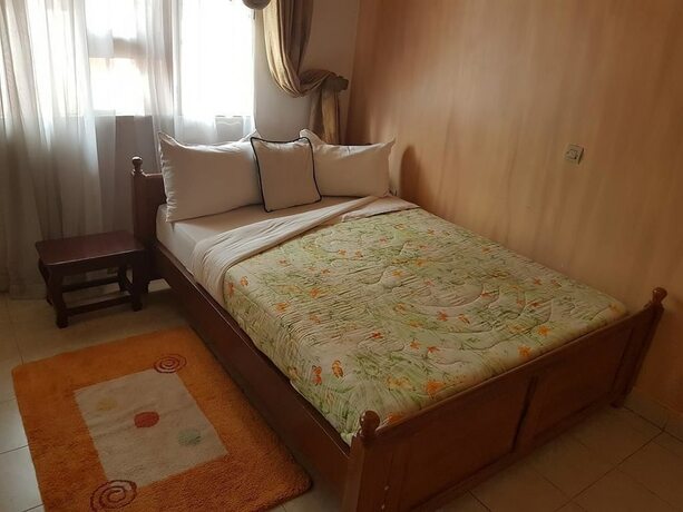 Imagen de la habitación del Hotel Mubwiza Courts. Foto 15