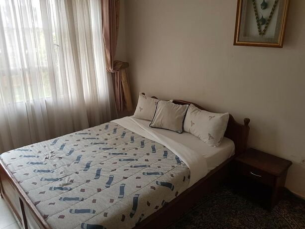 Imagen de la habitación del Hotel Mubwiza Courts. Foto 17