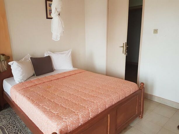 Imagen de la habitación del Hotel Mubwiza Courts. Foto 18