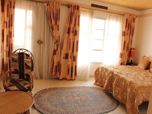 Imagen de la habitación del Hotel Mubwiza Courts. Foto 19