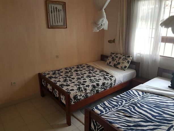 Imagen de la habitación del Hotel Mubwiza Courts. Foto 20