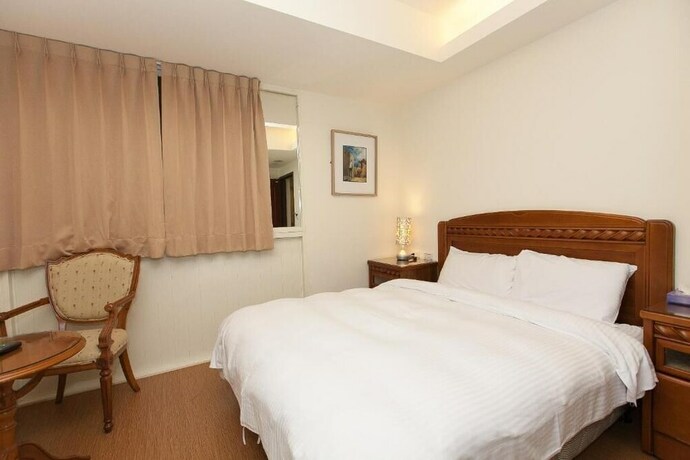 Imagen de la habitación del Hotel Mucha, Yilan City. Foto 26