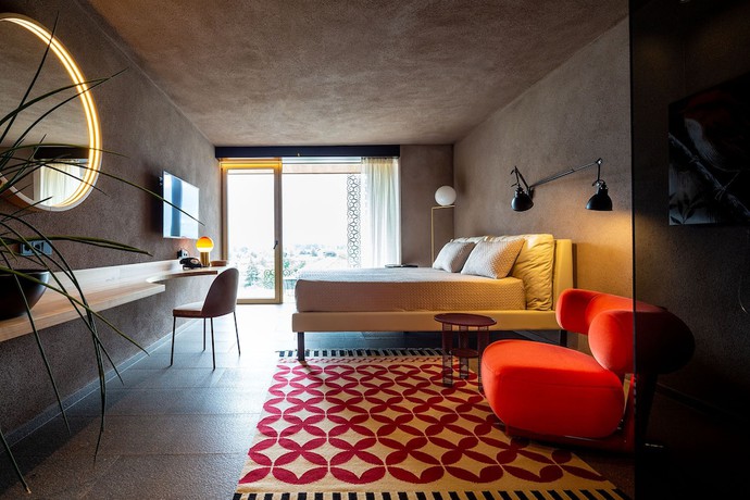 Imagen de la habitación del Hotel Muchele. Foto 16