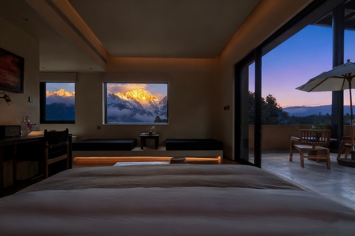 Imagen de la habitación del Hotel Mucheng Xichi Snow Mountain Art Resort. Foto 5