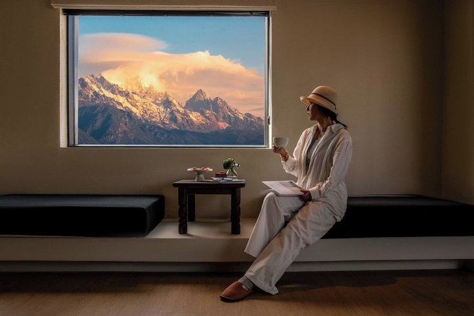 Imagen de la habitación del Hotel Mucheng Xichi Snow Mountain Art Resort. Foto 6