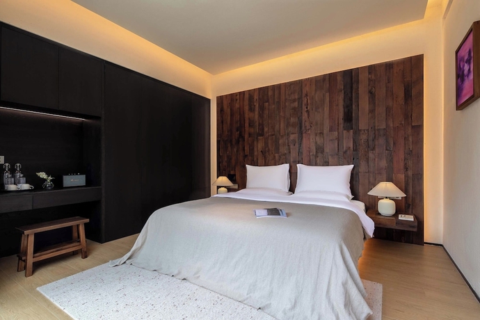 Imagen de la habitación del Hotel Mucheng Xichi Snow Mountain Art Resort. Foto 11