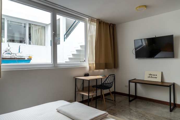 Imagen de la habitación del Hotel MuchoSur Santa Marta. Foto 11