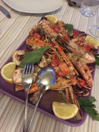 Imagen del bar/restaurante del Hotel Mûita Di Mari. Foto 3