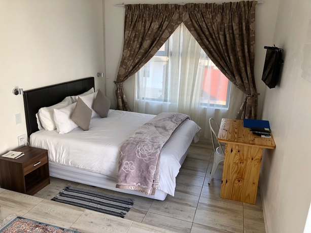 Imagen de la habitación del Hotel Muco Guest House. Foto 10