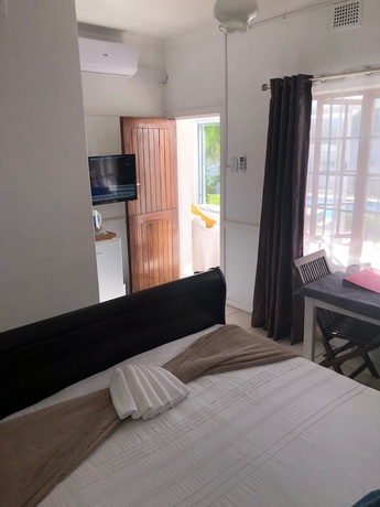 Imagen de la habitación del Hotel Muco Guest House. Foto 15