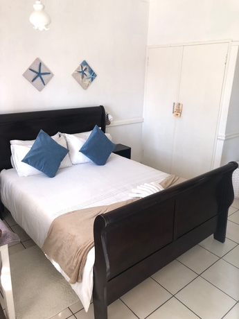 Imagen de la habitación del Hotel Muco Guest House. Foto 17