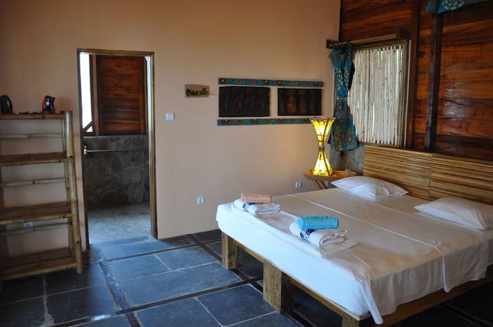 Imagen de la habitación del Hotel Mucumbli. Foto 16