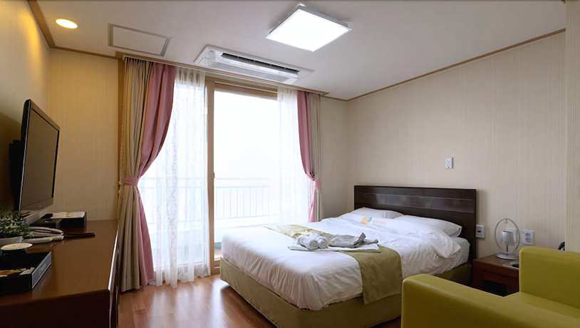 Imagen de la habitación del Hotel Mud Beach. Foto 15