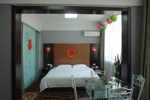 Imagen de la habitación del Hotel Mudan River. Foto 3