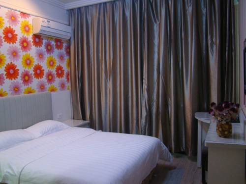 Imagen de la habitación del Hotel Mudan River. Foto 7