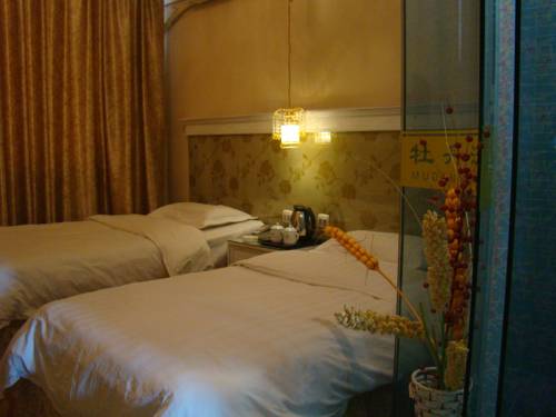 Imagen de la habitación del Hotel Mudan River. Foto 9