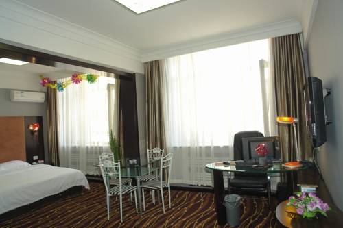 Imagen de la habitación del Hotel Mudan River. Foto 10