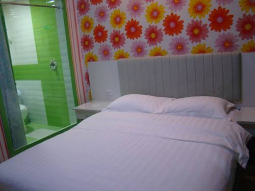 Imagen de la habitación del Hotel Mudan River. Foto 11