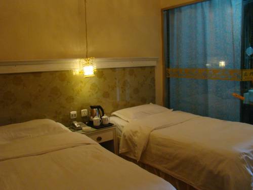 Imagen de la habitación del Hotel Mudan River. Foto 12