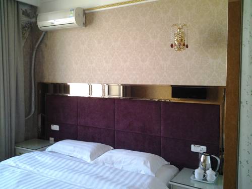 Imagen de la habitación del Hotel Mudan River. Foto 13