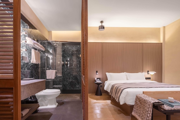 Imagen de la habitación del Hotel Mudita City. Foto 16