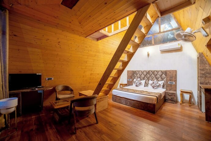Imagen de la habitación del Hotel Mudras Grove Resort. Foto 12