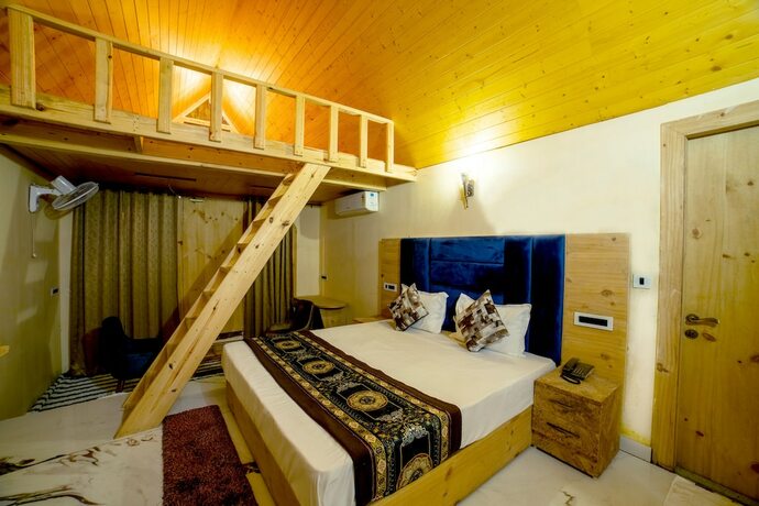 Imagen de la habitación del Hotel Mudras Grove Resort. Foto 14