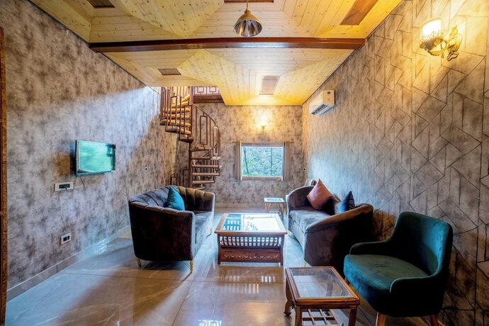 Imagen de la habitación del Hotel Mudras Grove Resort. Foto 15