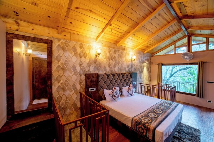 Imagen de la habitación del Hotel Mudras Grove Resort. Foto 16