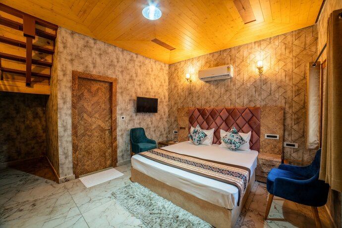 Imagen de la habitación del Hotel Mudras Grove Resort. Foto 17