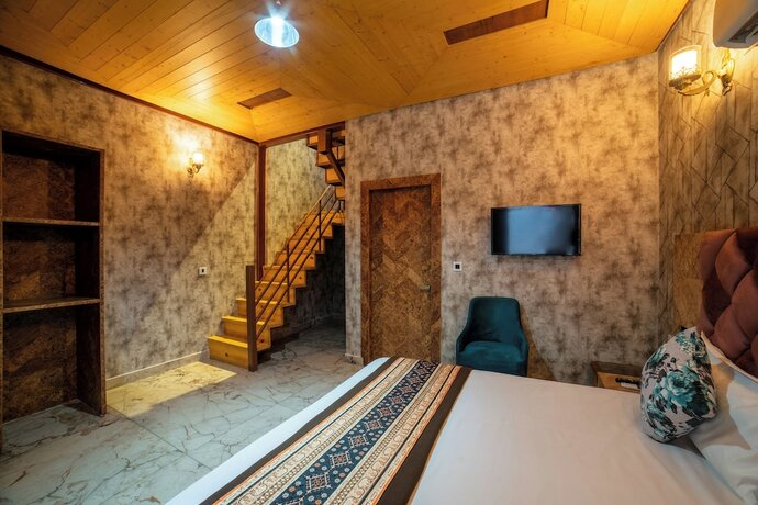 Imagen de la habitación del Hotel Mudras Grove Resort. Foto 18