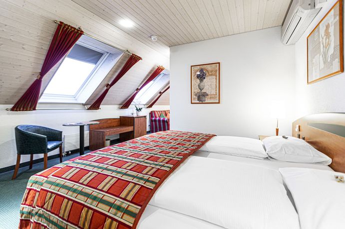 Imagen de la habitación del Hotel Muenchwilen. Foto 2