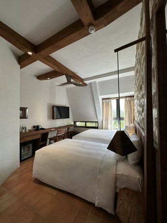 Imagen de la habitación del Hotel M&ugrave;a Dalat Wellness. Foto 13