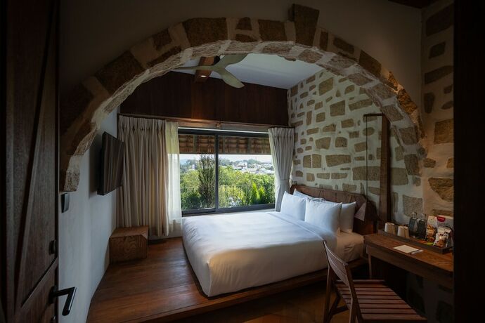 Imagen de la habitación del Hotel M&ugrave;a Dalat Wellness. Foto 15