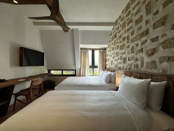 Imagen de la habitación del Hotel M&ugrave;a Dalat Wellness. Foto 17