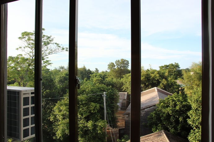 Imagen de la habitación del Hotel Muhai Guesthouse. Foto 8