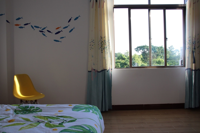 Imagen de la habitación del Hotel Muhai Guesthouse. Foto 9