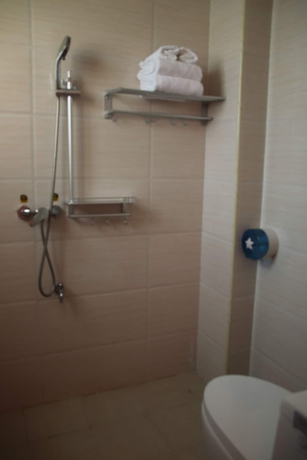 Imagen de la habitación del Hotel Muhai Guesthouse. Foto 12